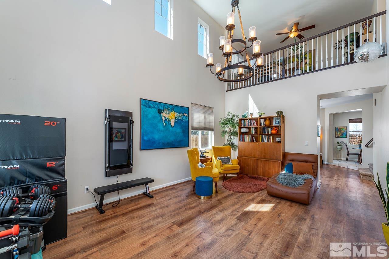 2241 Big Trail Circle Reno, NV 89521 - Photo 3 of 40 a living room with furniture and a flat screen tv