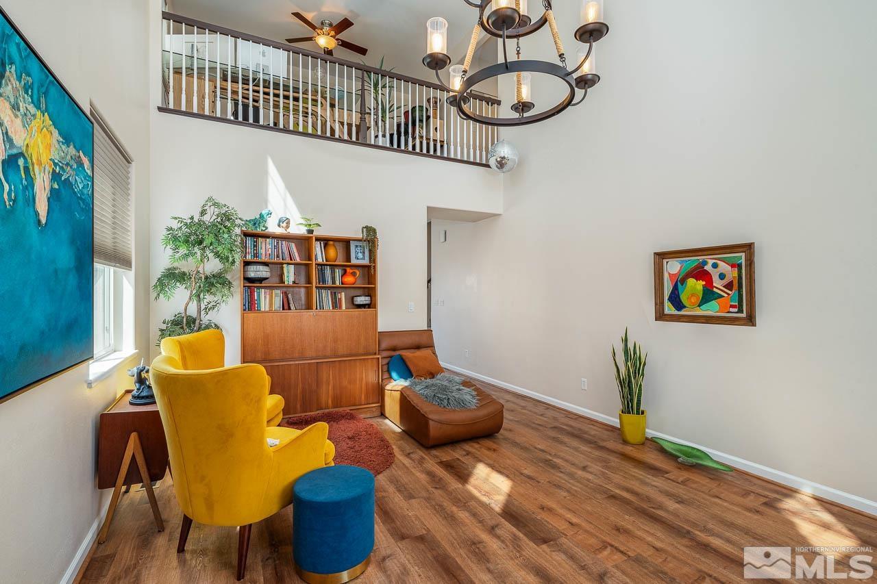 2241 Big Trail Circle Reno, NV 89521 - Photo 4 of 40 a living room with furniture stairs and a window