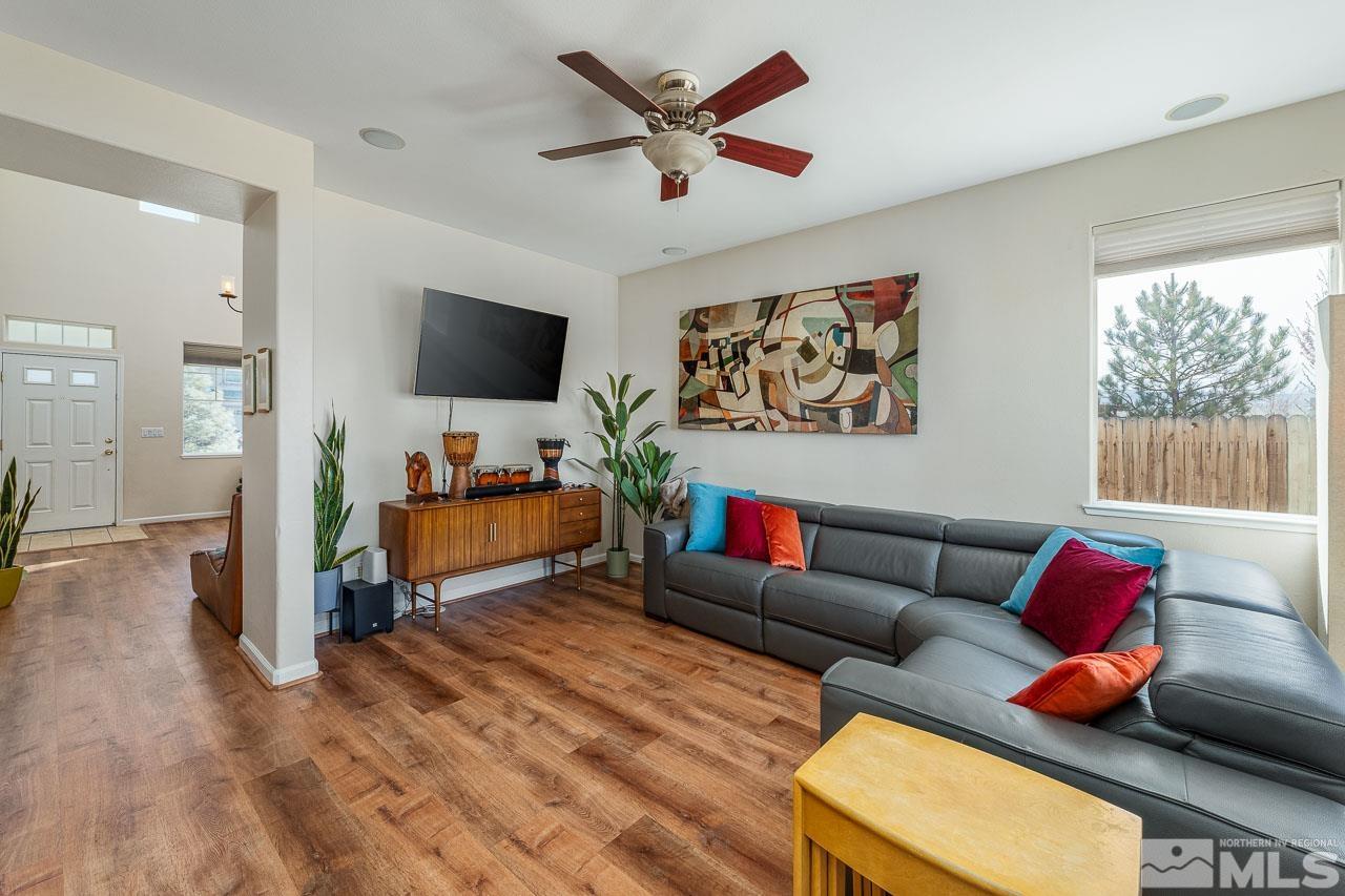 2241 Big Trail Circle Reno, NV 89521 - Photo 6 of 40 a living room with furniture and a flat screen tv