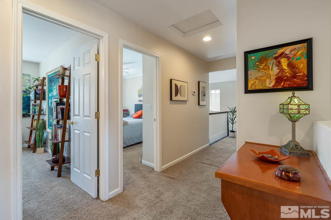 2241 Big Trail Circle Reno, NV 89521 - Photo 7 of 40 a living room with furniture and a flat screen tv