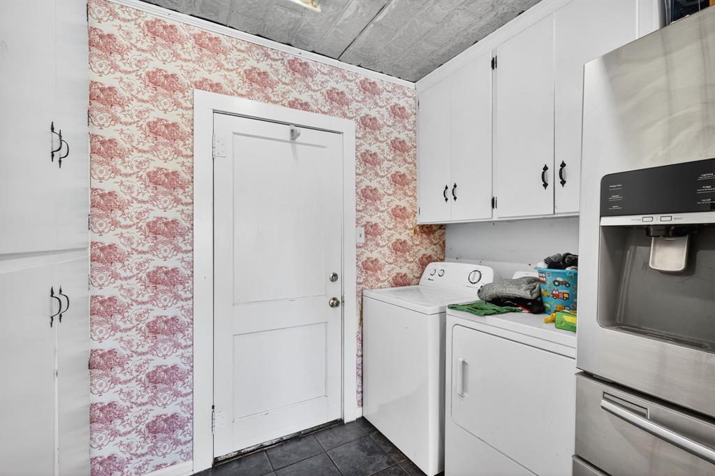 605 Highway 36 Comanche, TX 76442 - Photo 23 of 36 a room with storage and utility