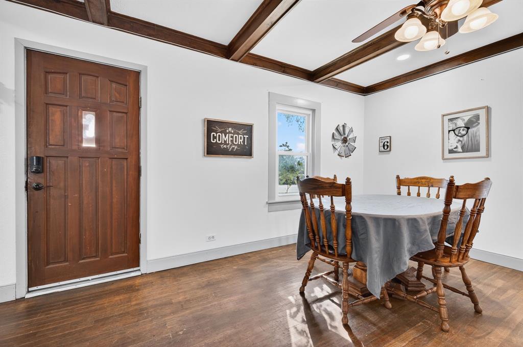 605 Highway 36 Comanche, TX 76442 - Photo 3 of 36 a view of a dining room with furniture and wooden floor