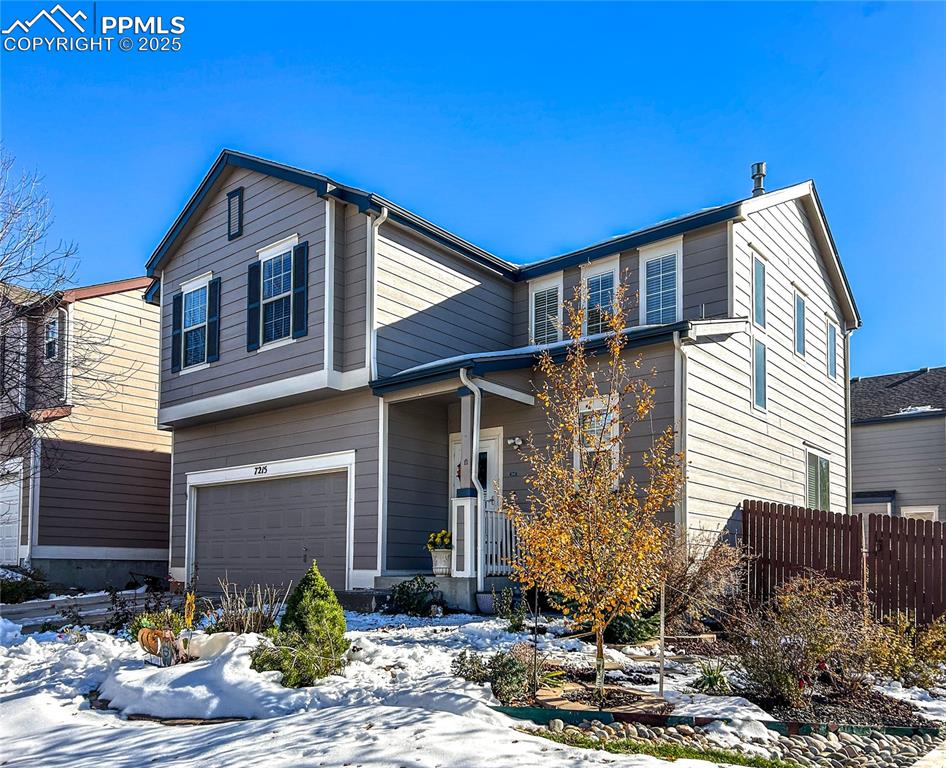 7215 Canal Point Colorado Springs, CO 80922 - Photo 1 of 24 a front view of a house with yard