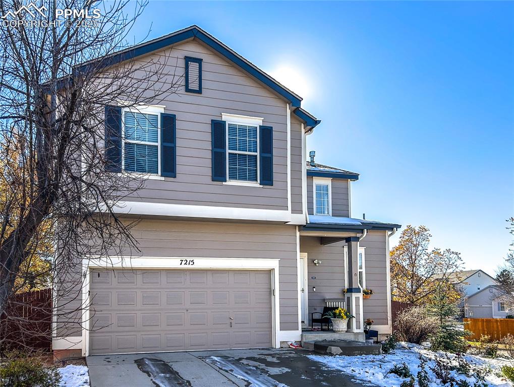 7215 Canal Point Colorado Springs, CO 80922 - Photo 3 of 24 a front view of a house with garden