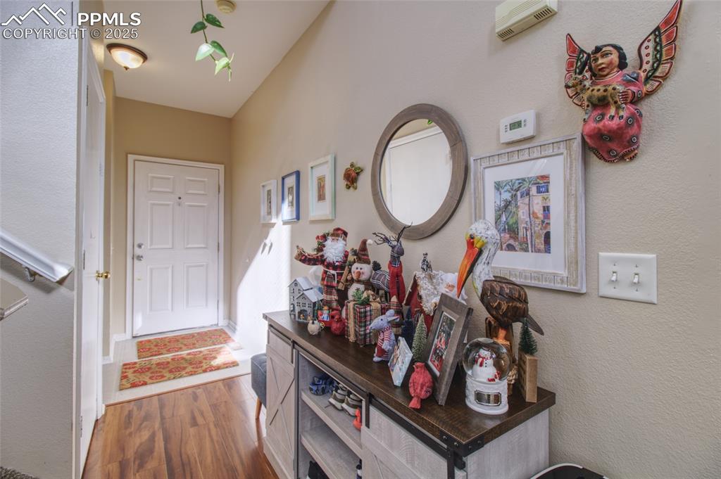 7215 Canal Point Colorado Springs, CO 80922 - Photo 5 of 24 a view of a entryway with furniture and livingroom view