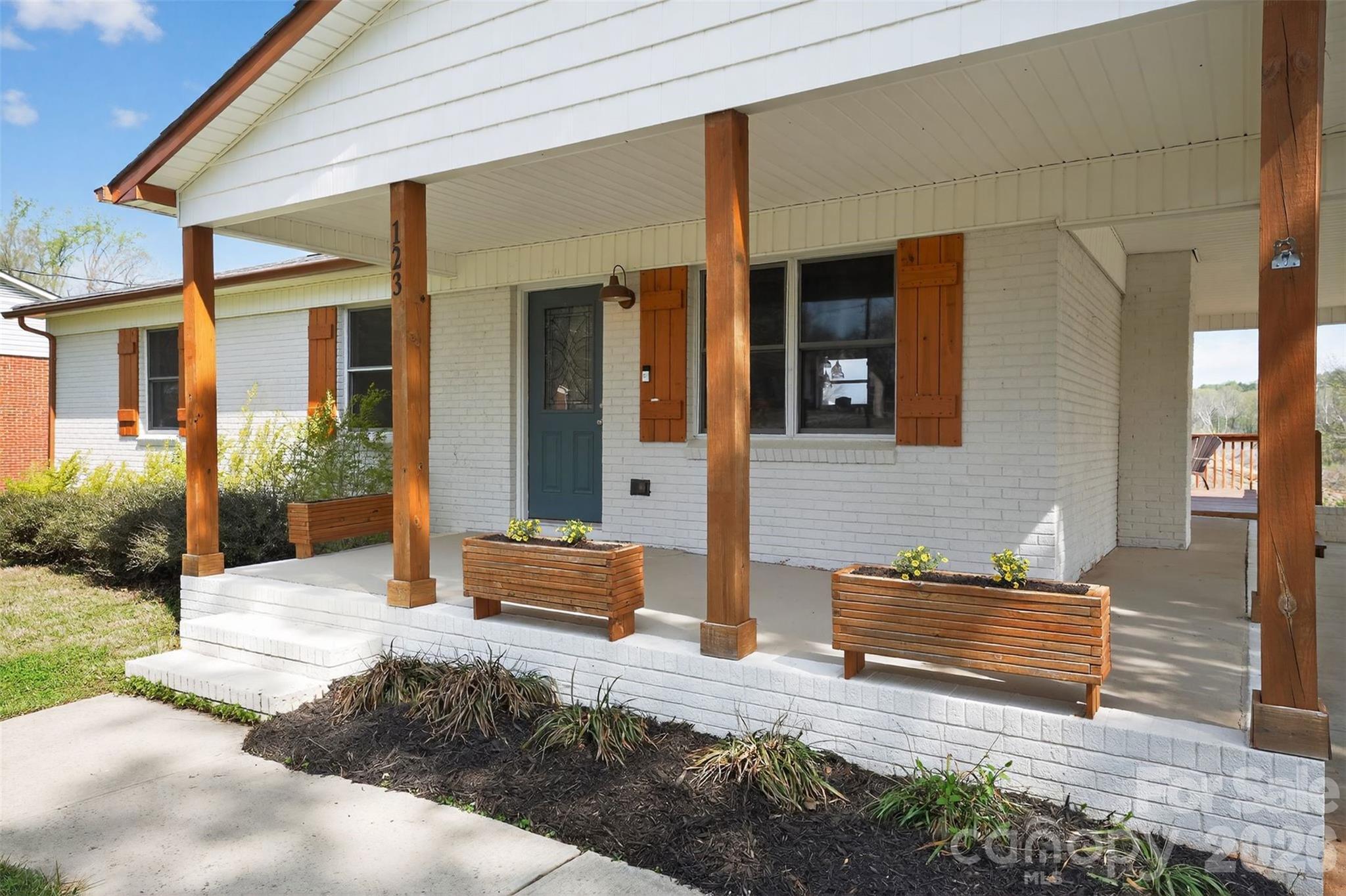 123 Rowe Street Gastonia, NC 28056 - Photo 2 of 20 a front view of a house with a yard