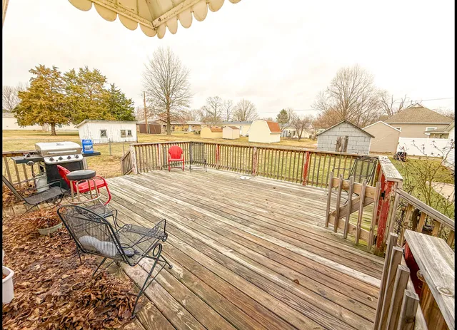 a view of roof deck with patio