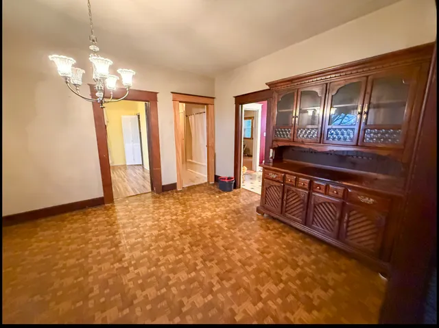 a bathroom with a sink a mirror and a shower