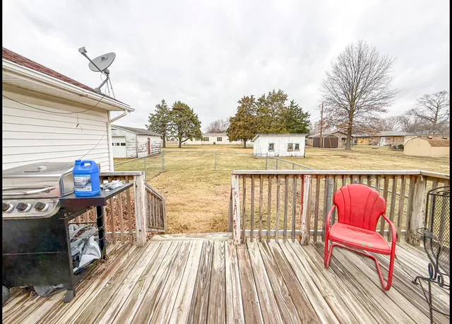 a view of a chairs on a deck