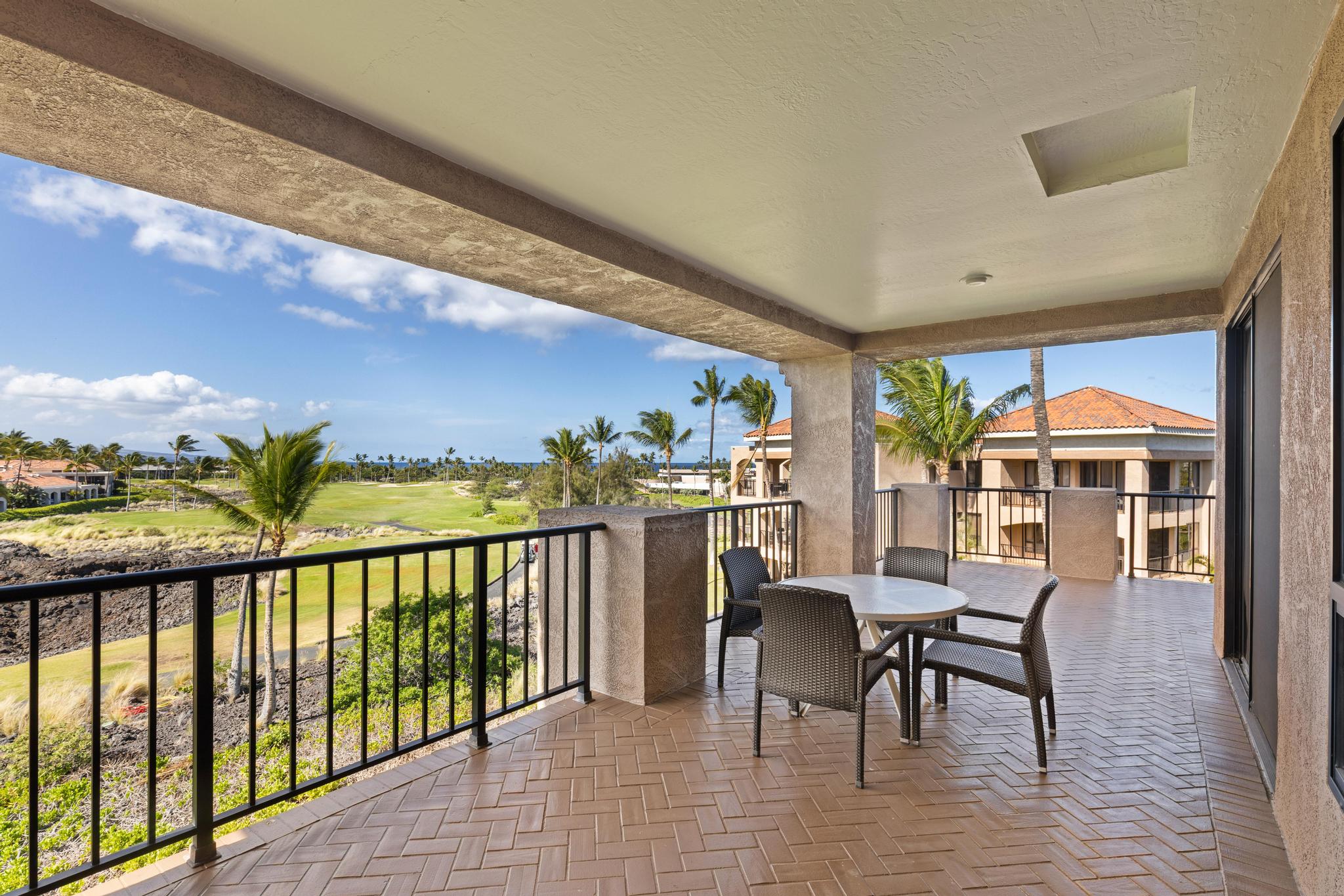 69-450 Bay Club, Unit 236 Waikoloa, HI 96738 - Photo 4 of 22 a view of a chairs and table in a balcony
