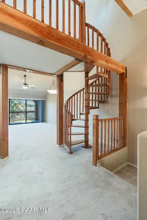 a view of a balcony with wooden floor