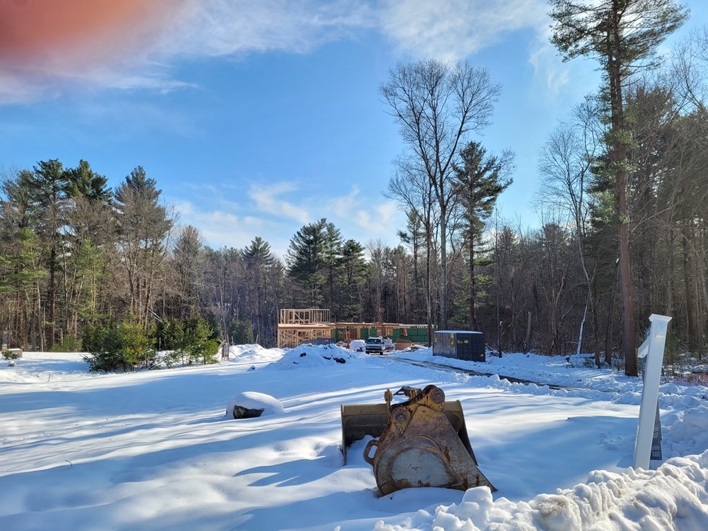 48 Bubbling Brook Road Walpole, MA 02081 - Photo 13 of 14 a view of patio with a table and chairs and a fire pit