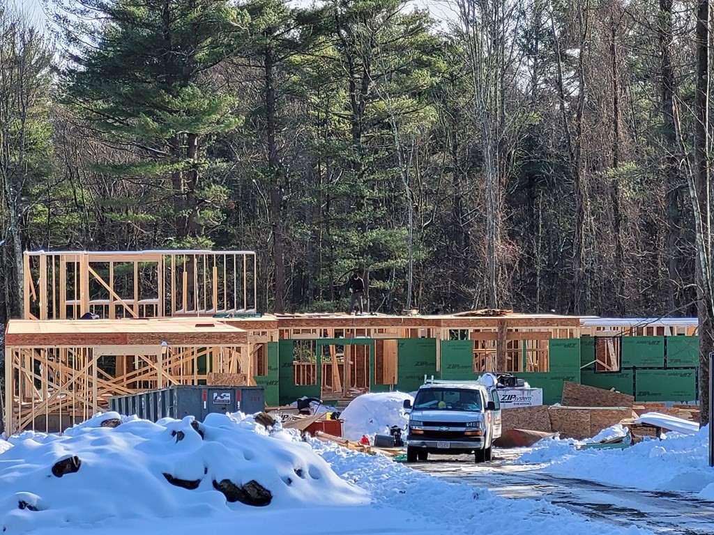 48 Bubbling Brook Road Walpole, MA 02081 - Photo 14 of 14 a front view of a house with swimming pool