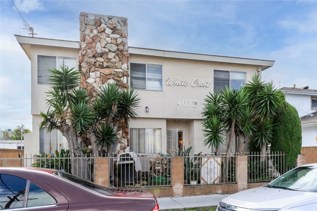 4012 West 133rd Street, Unit 8 Hawthorne, CA 90250 - Photo 2 of 20 a front view of house with small garden