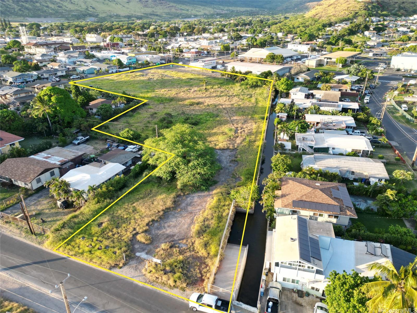 85-29 Lualualei Homestead Road Waianae, HI 96792 - Photo 4 of 7 an aerial view of residential houses with outdoor space