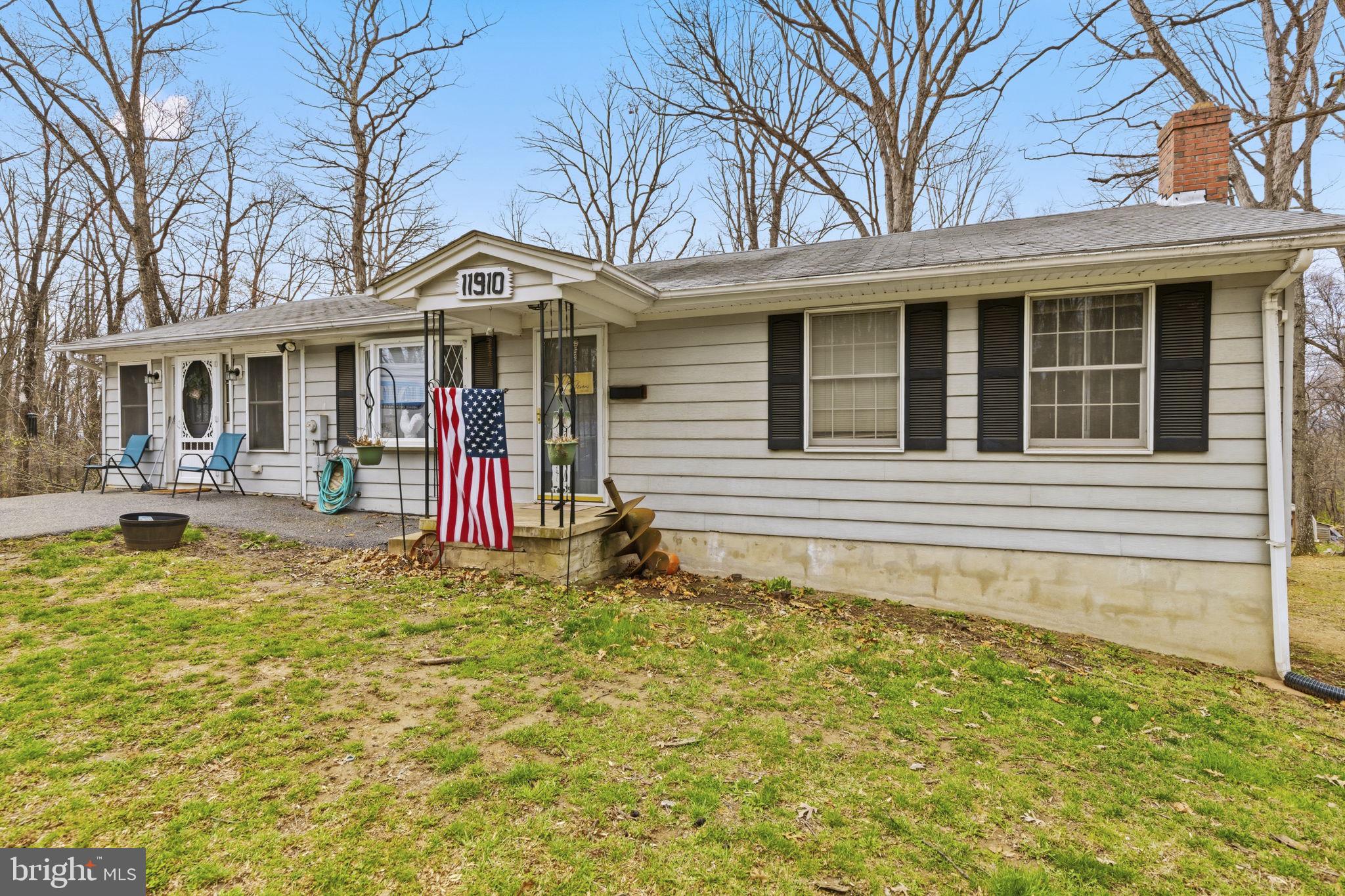 11910 Warner Road Keymar, MD 21757 - Photo 1 of 51 a front view of a house with a yard