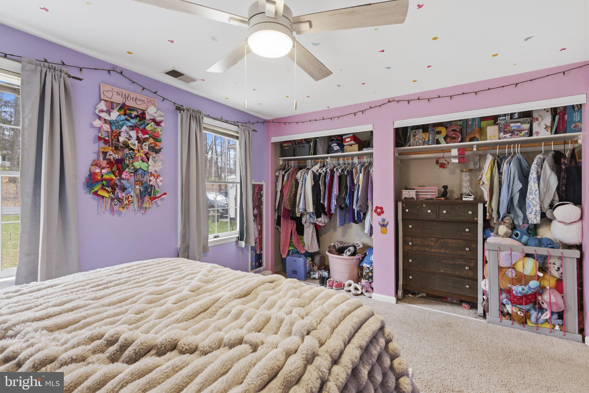 11910 Warner Road Keymar, MD 21757 - Photo 18 of 51 a bedroom with a bed and a walk in closet