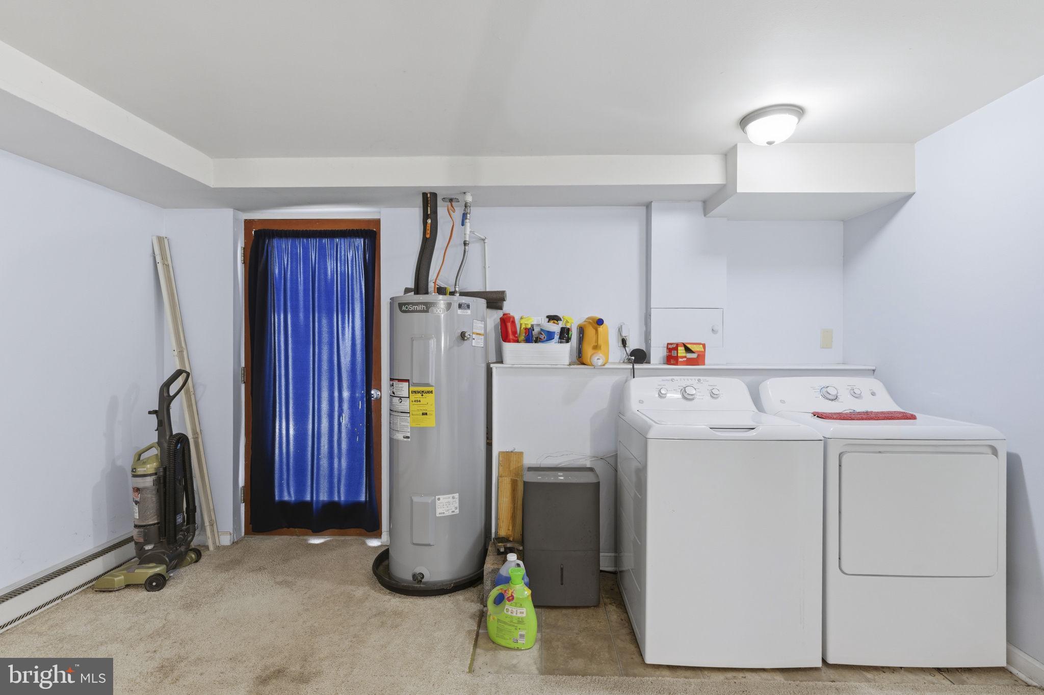 11910 Warner Road Keymar, MD 21757 - Photo 22 of 51 a utility room with dryer and washer