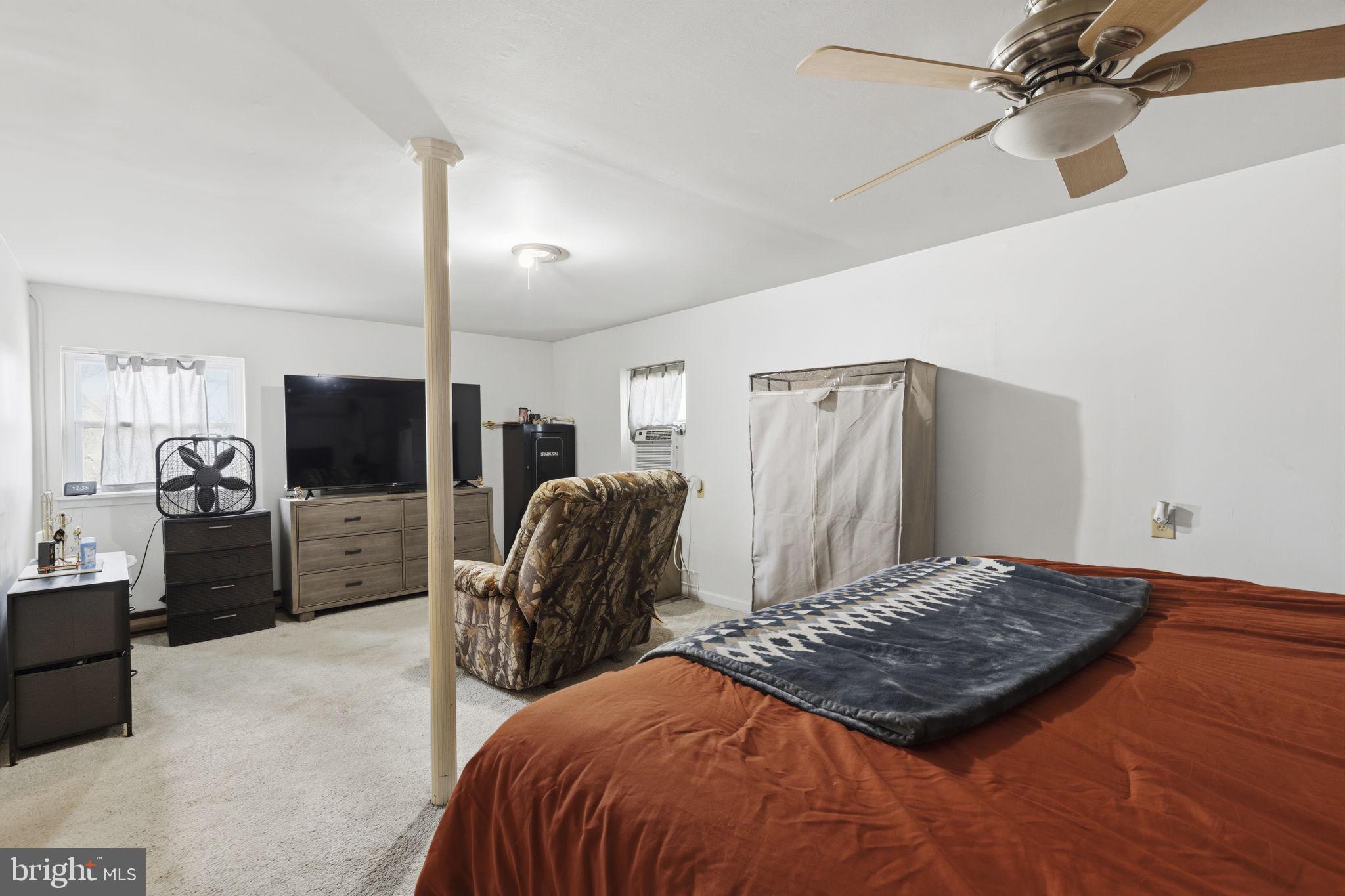 11910 Warner Road Keymar, MD 21757 - Photo 24 of 51 a bedroom with bed and tv