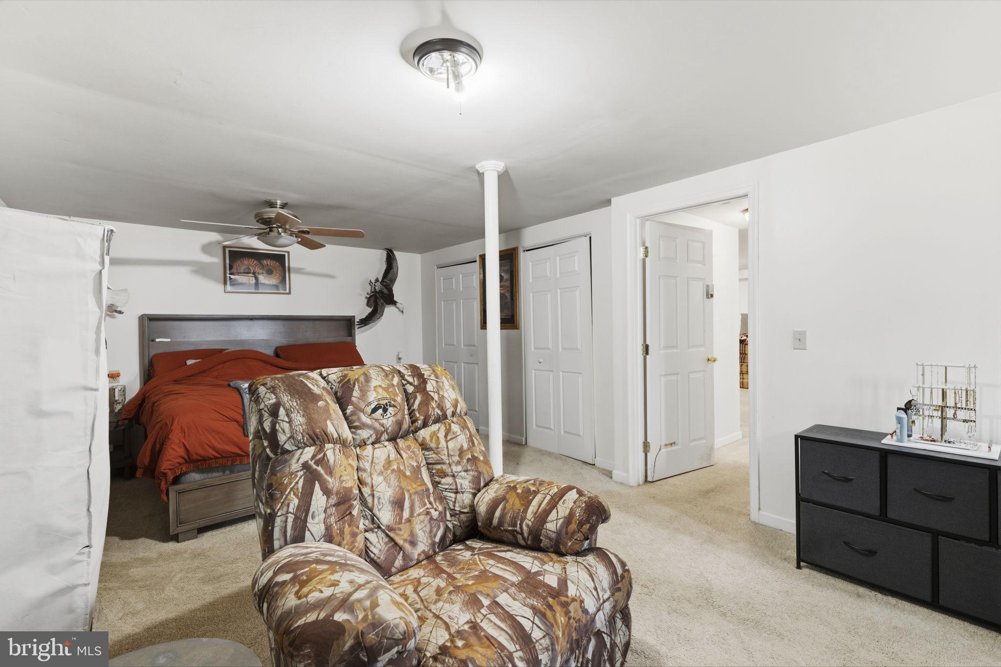 11910 Warner Road Keymar, MD 21757 - Photo 25 of 51 a bedroom with a bed and a mirror