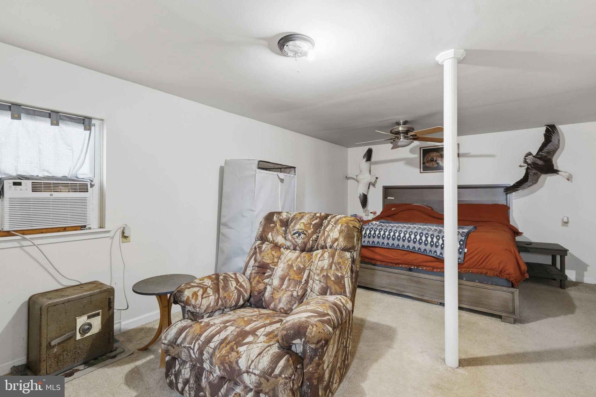 11910 Warner Road Keymar, MD 21757 - Photo 26 of 51 a bedroom with furniture and a couch