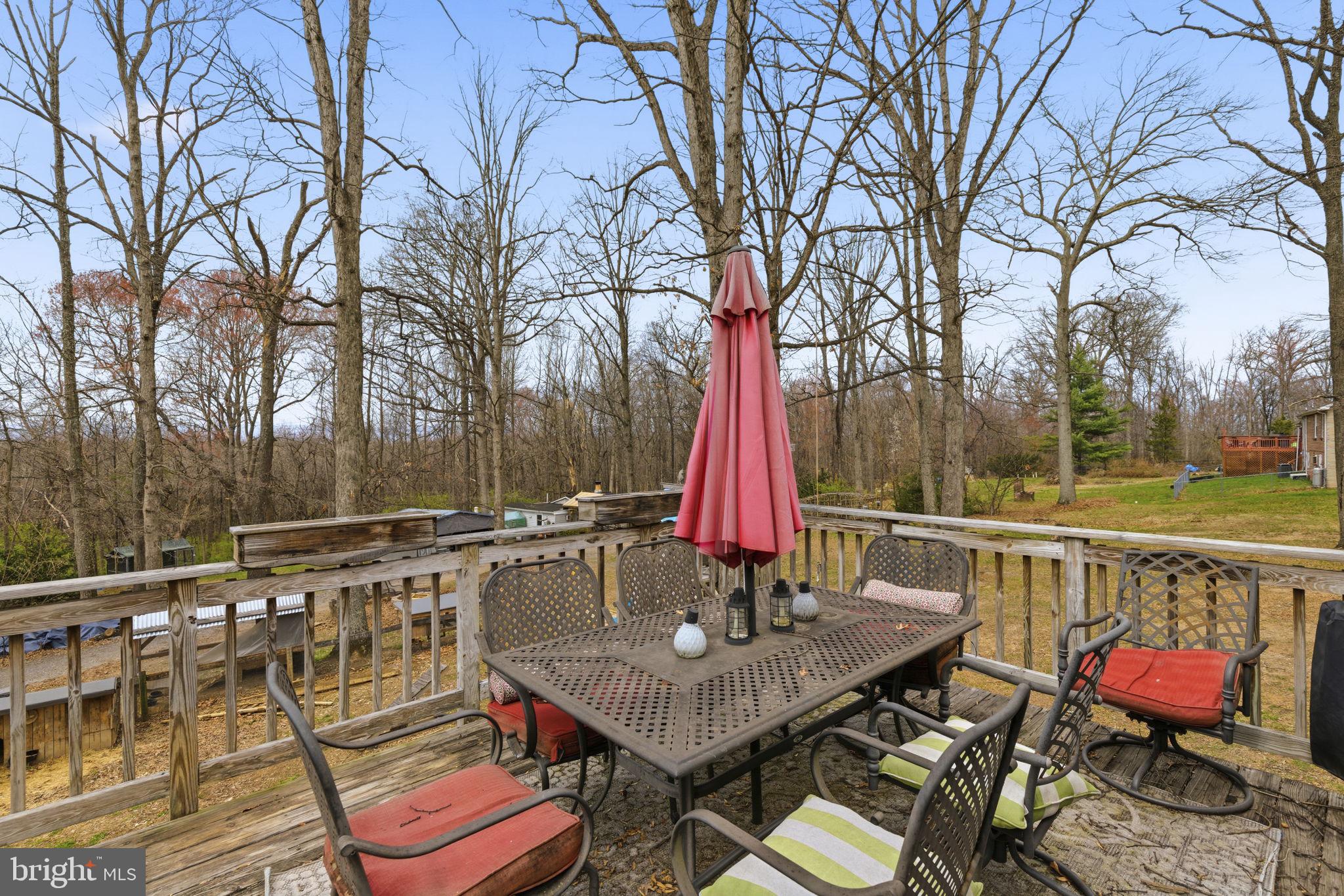 11910 Warner Road Keymar, MD 21757 - Photo 30 of 51 a view of a patio with couches and wooden fence