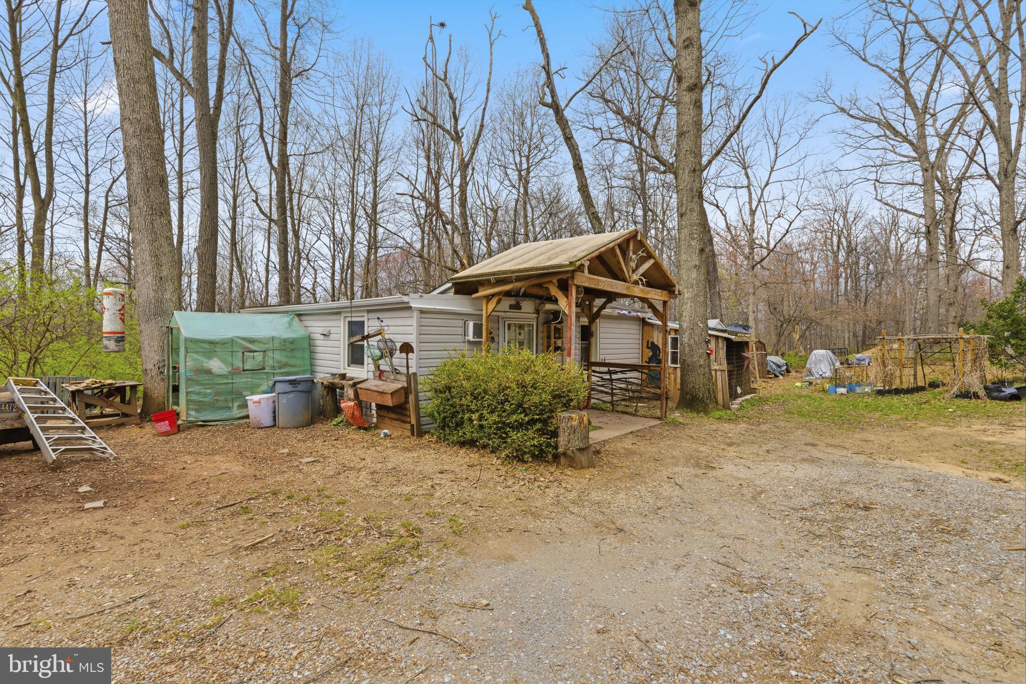 11910 Warner Road Keymar, MD 21757 - Photo 36 of 51 a view of a dirt road with a building