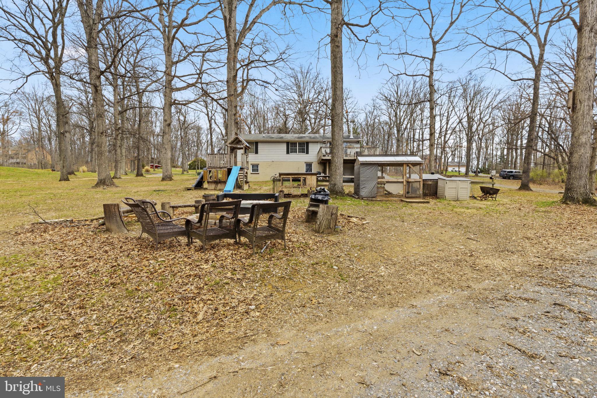 11910 Warner Road Keymar, MD 21757 - Photo 40 of 51 a view of a lake with outdoor seating