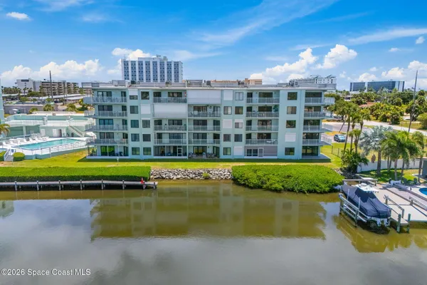 a view of a swimming pool with a lake view