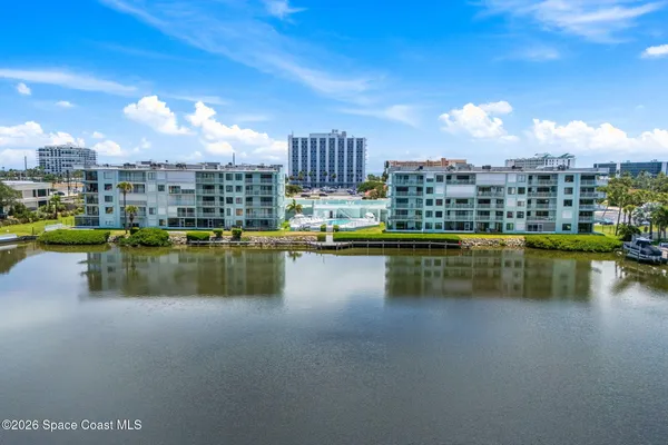 a view of a lake with a city