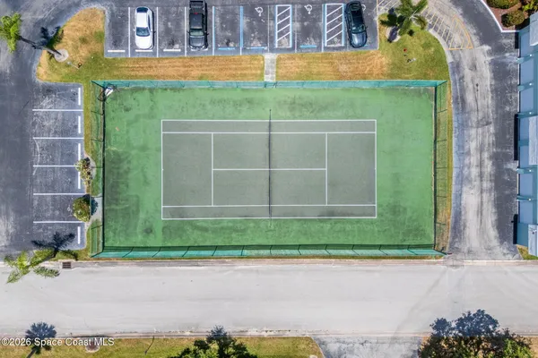 a view of a backyard of the house