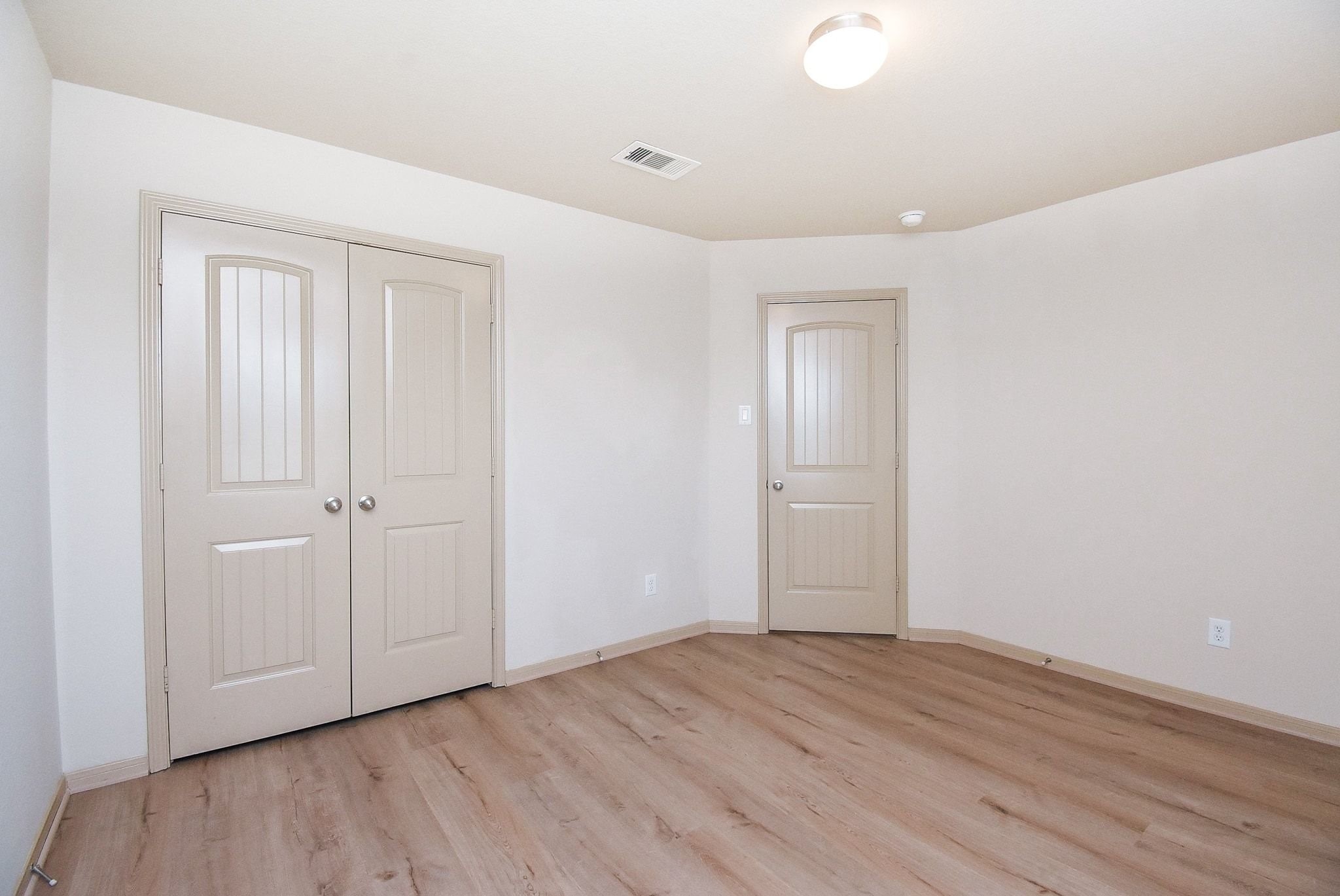2106 Harmon Crest Court Spring, TX 77373 - Photo 33 of 37 a view of an empty room with wooden floor