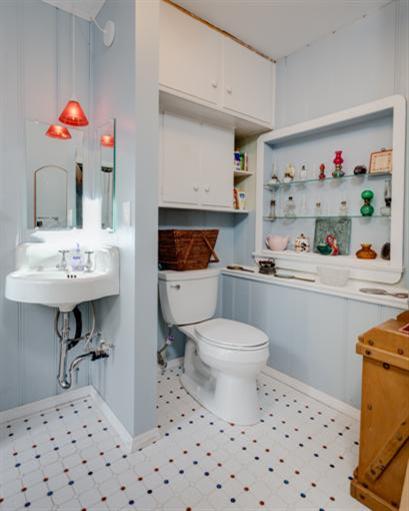4230 Thacher Road Ojai, CA 93023 - Photo 12 of 22 a bathroom with a sink toilet and a mirror