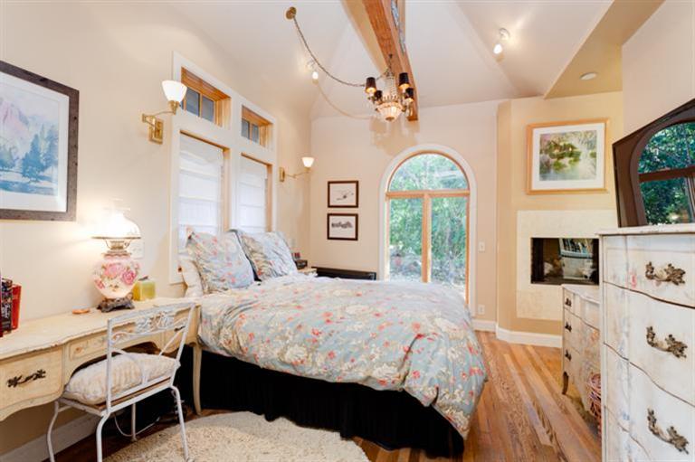 4230 Thacher Road Ojai, CA 93023 - Photo 13 of 22 a bedroom with a bed window and table chair
