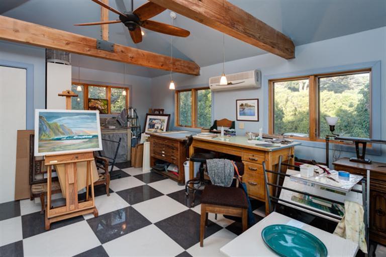 4230 Thacher Road Ojai, CA 93023 - Photo 21 of 22 a living room with furniture a fireplace and a table