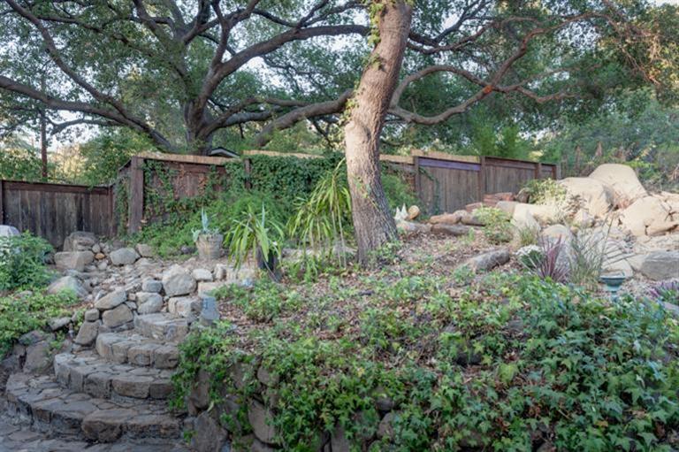 4230 Thacher Road Ojai, CA 93023 - Photo 22 of 22 a garden view with lots of plants and trees