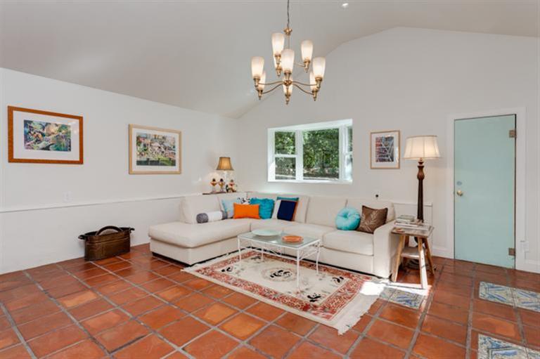 4230 Thacher Road Ojai, CA 93023 - Photo 4 of 22 a living room with furniture a chandelier and a table