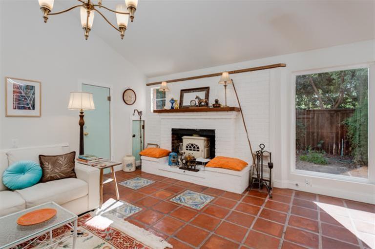 4230 Thacher Road Ojai, CA 93023 - Photo 5 of 22 a living room with furniture a rug and a fireplace