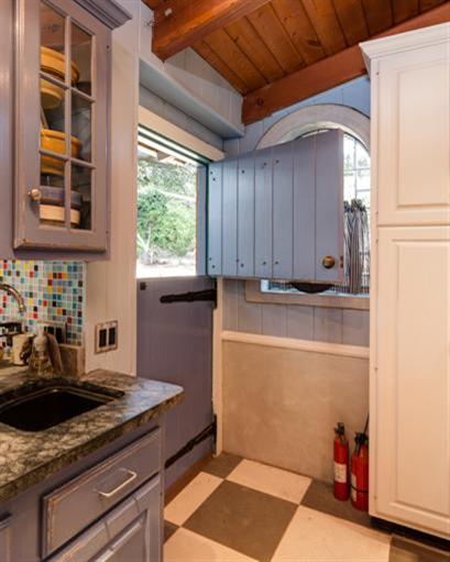 4230 Thacher Road Ojai, CA 93023 - Photo 9 of 22 a kitchen with a stove and a window
