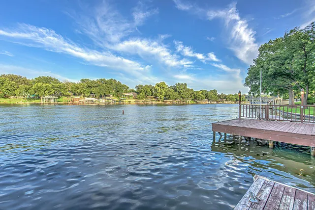 a view of a terrace with a lake view
