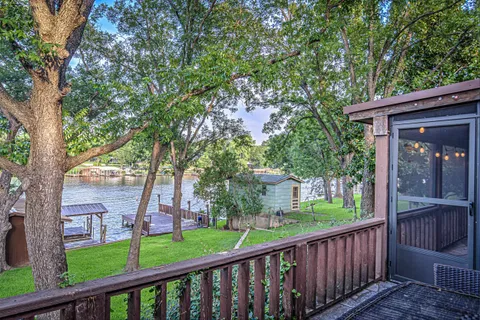 a view of backyard with green space