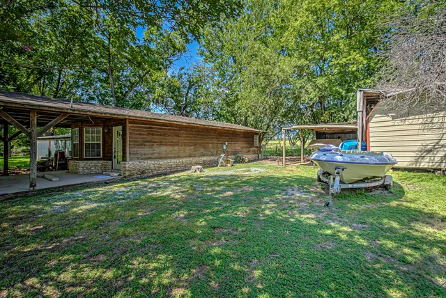 a view of a backyard of a house