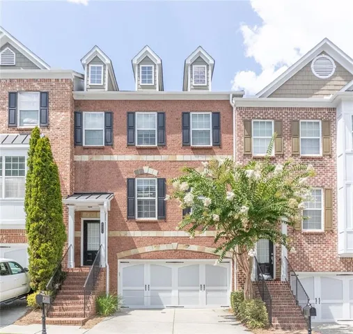 a front view of a multi story residential apartment building