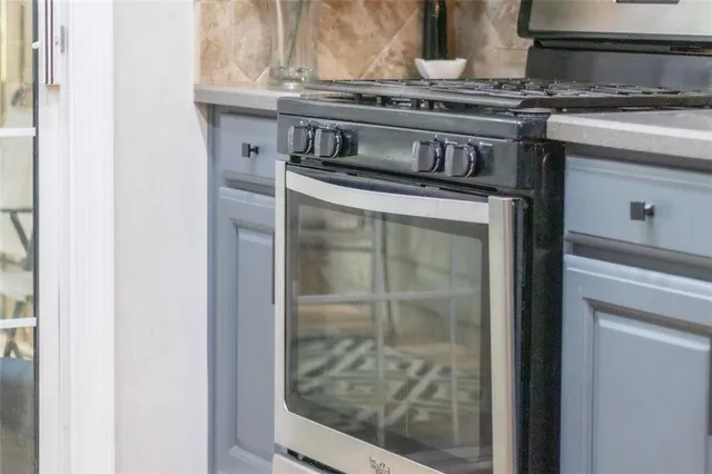 a view of a chairs and table in the balcony