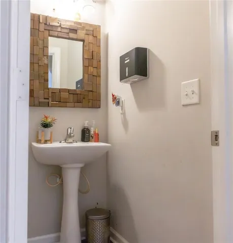 a view of a living room with a floor to ceiling window