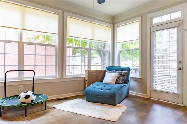a view of staircase with white walls and windows