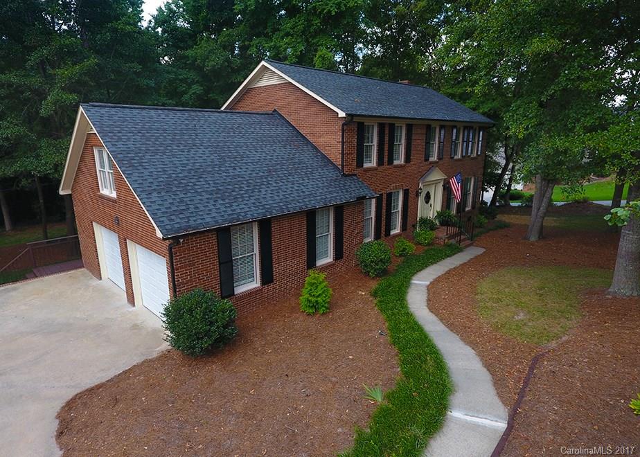 124 Friendfield Drive, Unit 10 Fort Mill, SC 29715 - Photo 2 of 24 a front view of a house with garden