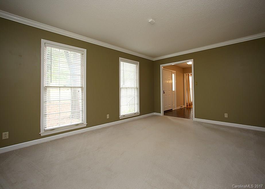 124 Friendfield Drive, Unit 10 Fort Mill, SC 29715 - Photo 18 of 24 an empty room with windows