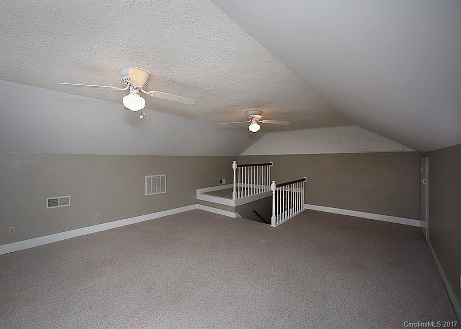 124 Friendfield Drive, Unit 10 Fort Mill, SC 29715 - Photo 20 of 24 an empty room with windows