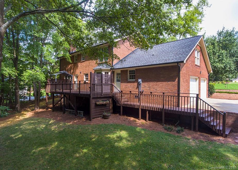 124 Friendfield Drive, Unit 10 Fort Mill, SC 29715 - Photo 22 of 24 a view of a house with a yard and deck